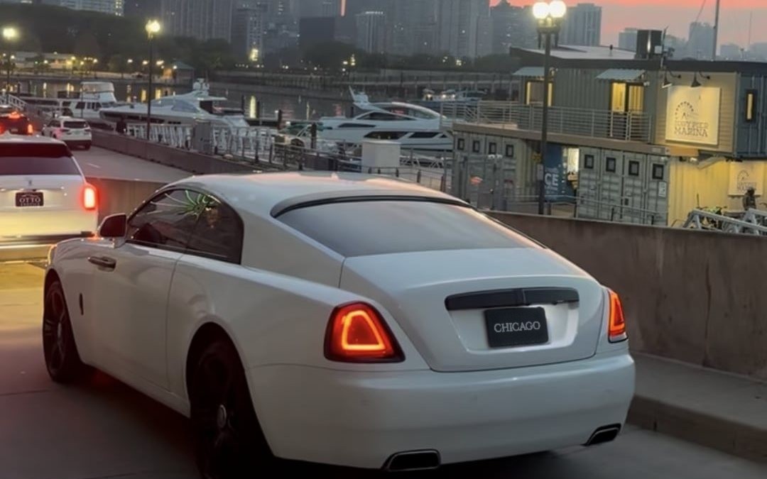 White Rolls-Royce Wraith rental at a Chicago harbor